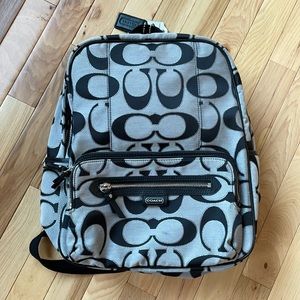 Coach backpack. Like new. Grey and black. Tiffany blue interior. 14x12x6 in